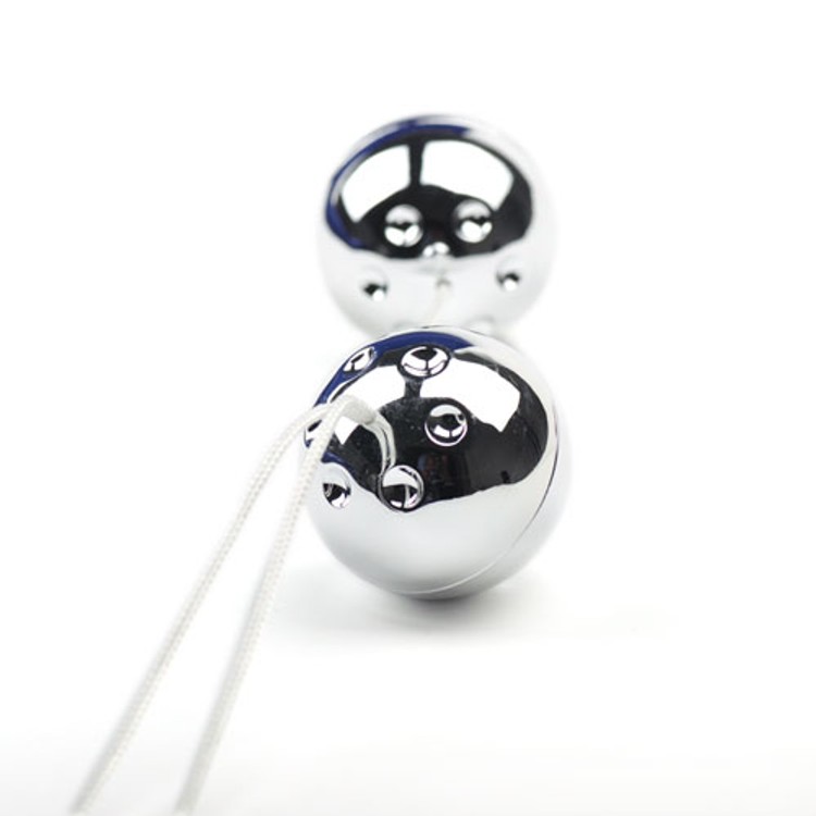 כדורים וגינאלים כסופים עם משקולות