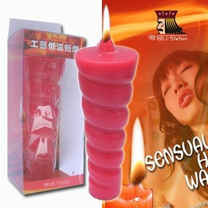 ​Curled red drip candle made of 100 percent paraffin​