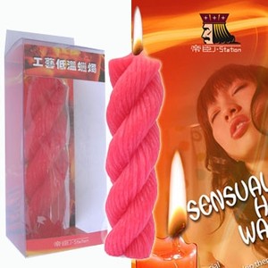 ​A wide curled red drip candle made of 100 percent paraffin​