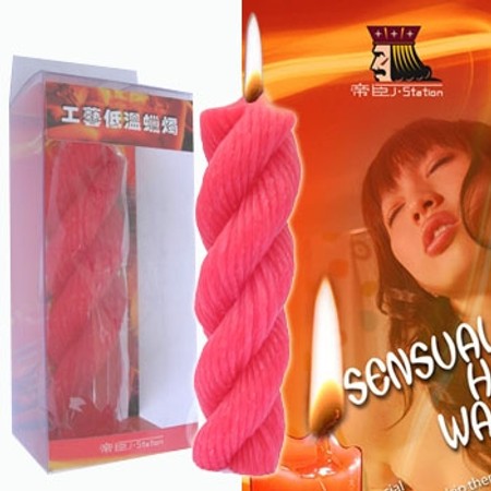 ​A wide curled red drip candle made of 100 percent paraffin​