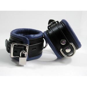 Wide handcuffs are made of premium black leather combined with blue