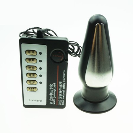 A medium electric anal plug is attached to the remote