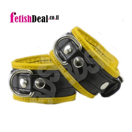 Quality handcuffs are made of premium black and yellow leather