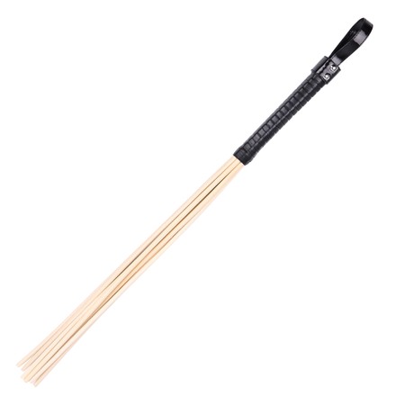 A thick multi-stick rattan cane with a black handle