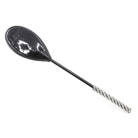Crop designed with a silver handle and a rounded leather head