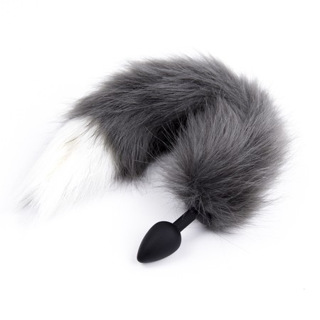 Black silicone anal plug with gray synthetic fur and white tip