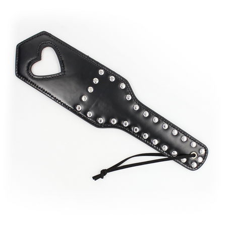 Black spanker decorated with rivets and heart