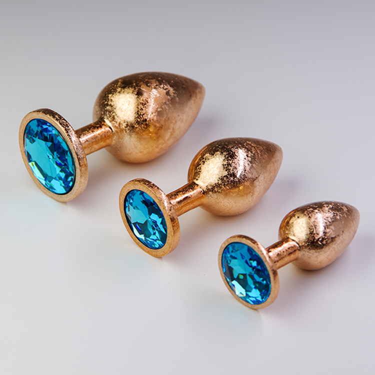 פלאג מתכת זהובה פרוסטי יהלום כחול אקווה